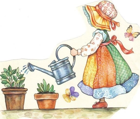 Девочка поливает цветы