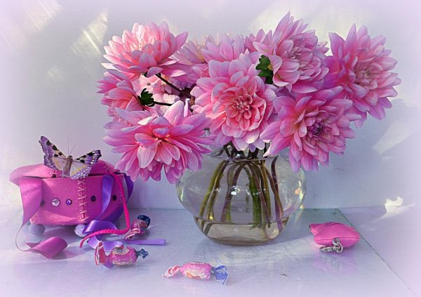 Цветы в чашке