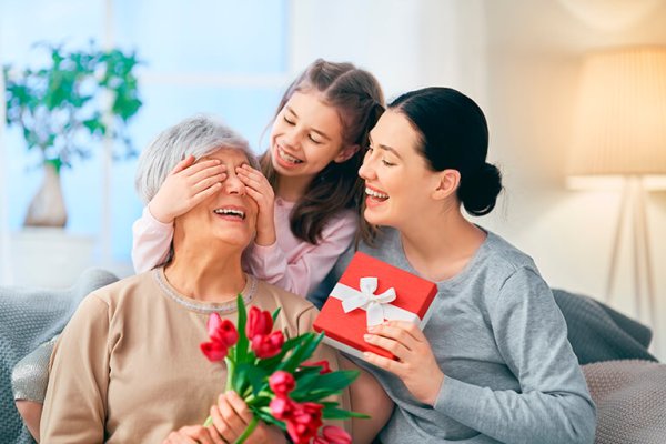 Women gives Gift to mother