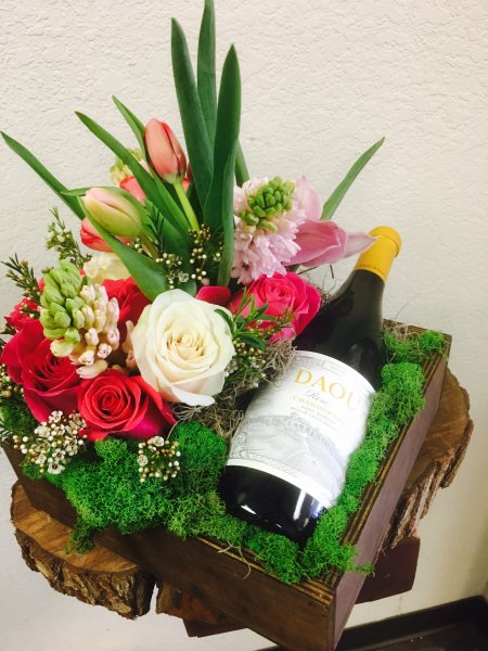 Букет цветов и шампанское