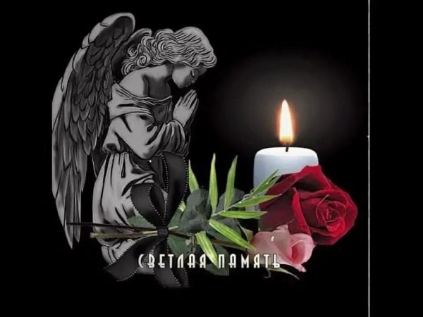 Поминальная свеча и цветы