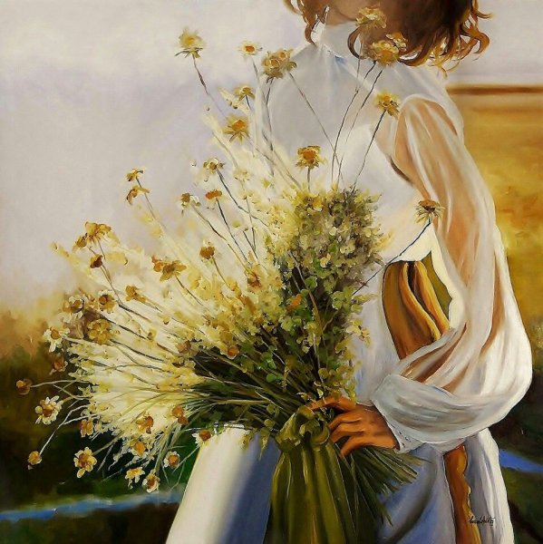 Рука держит цветок