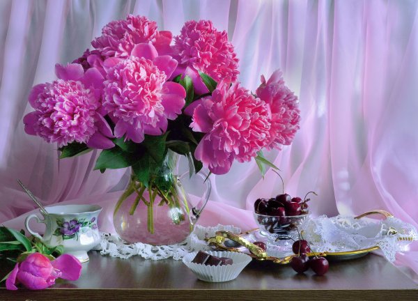 Цветы в чашке