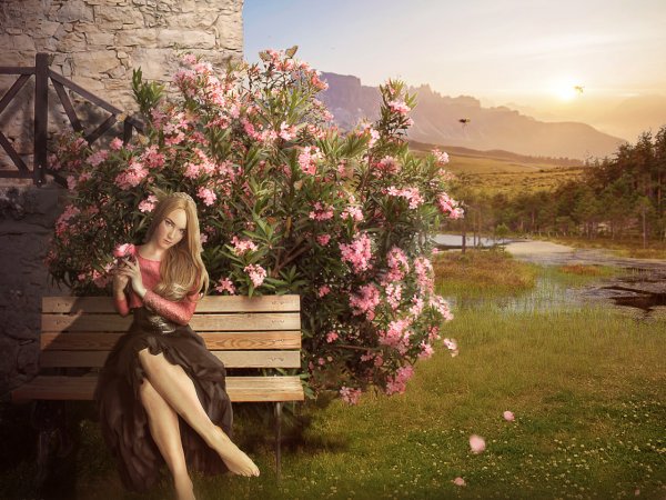 Женщина в саду с цветами