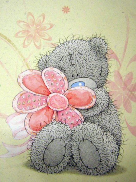 Мишка Тедди с цветочком