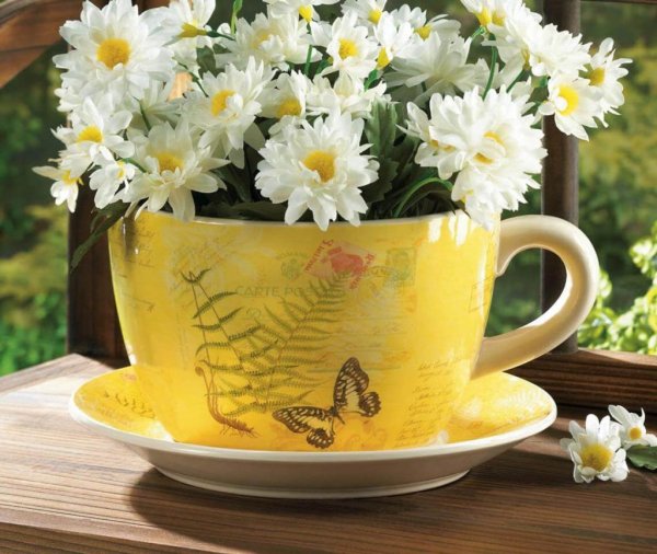 Нежный букет в чашке