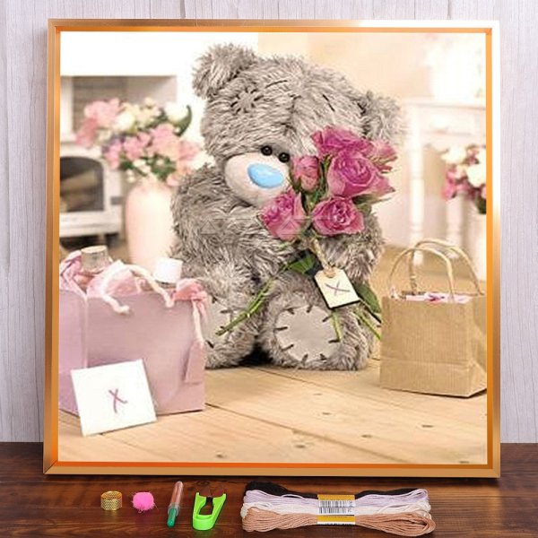 Мишка Тедди с цветком