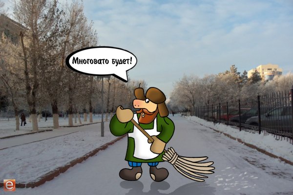 Рыжая кошка валяется в снегу