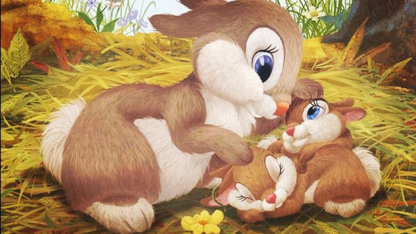 Зайчиха кормит зайчат