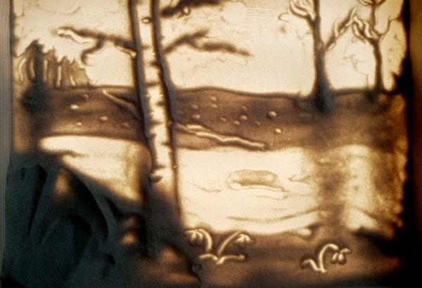 Песочные часы в песке