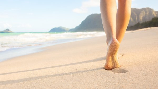 Стопы пляж песок