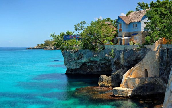 Seashore with people and buildings