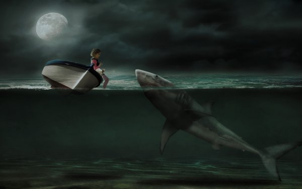 Девушка верхом на акуле