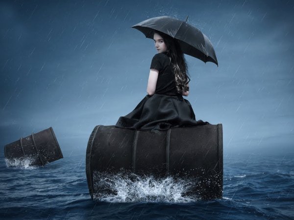 Девушка с зонтиком от солнца