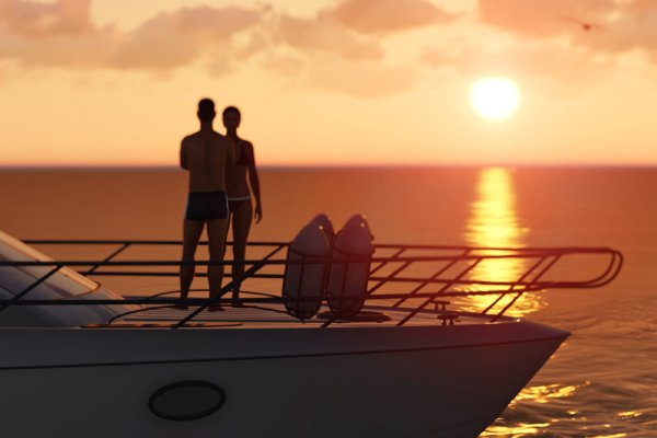 Пара на яхте на закате