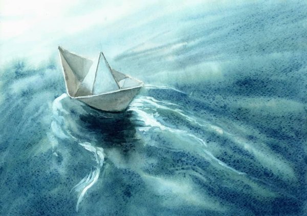Бумажный кораблик на волнах фото