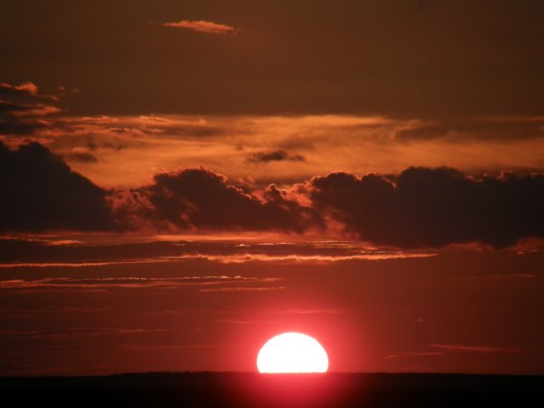 Солнце заходит за Горизонт