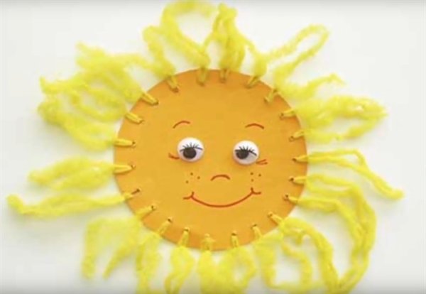 Поделка солнышко из ниток