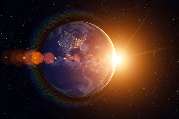 Планета земля и солнце