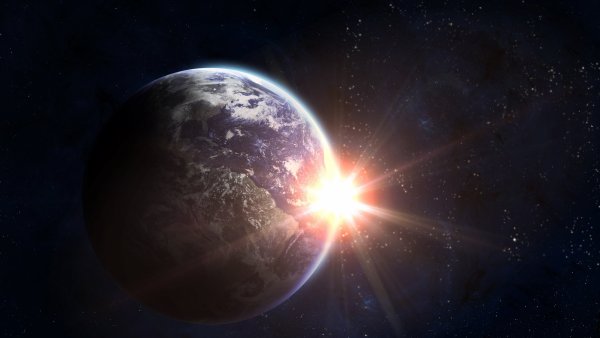 Планета земля и солнце