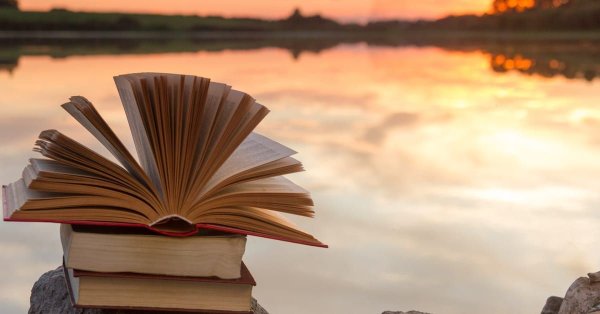 Книга на фоне заката
