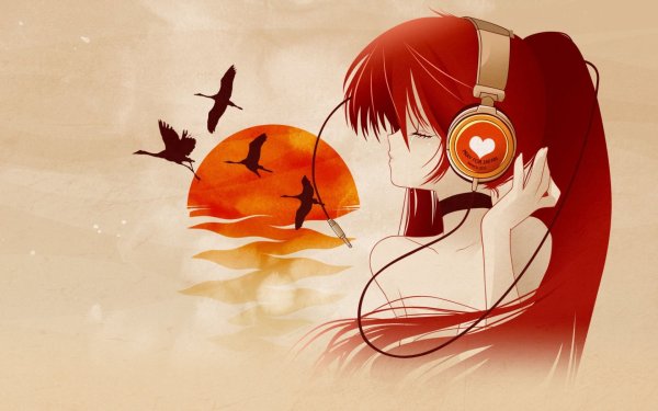 Рыжая девушка в наушниках