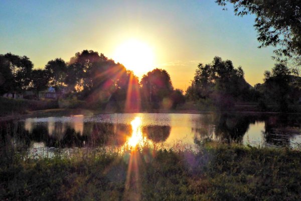 Закат над холмами