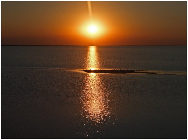 Сверкая на солнце