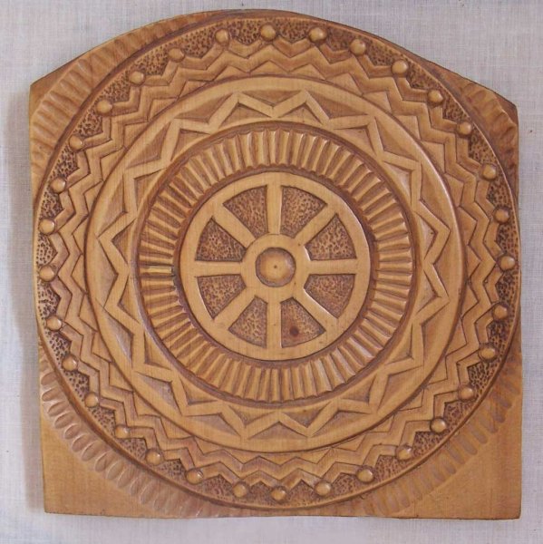 Солярные знаки в резьбе по дереву