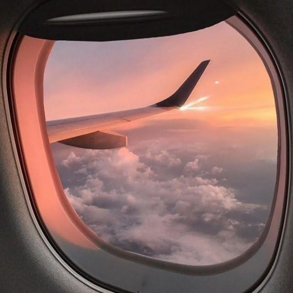 Закат из иллюминатора самолета