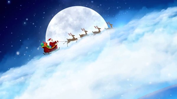 Санта на оленях в небе