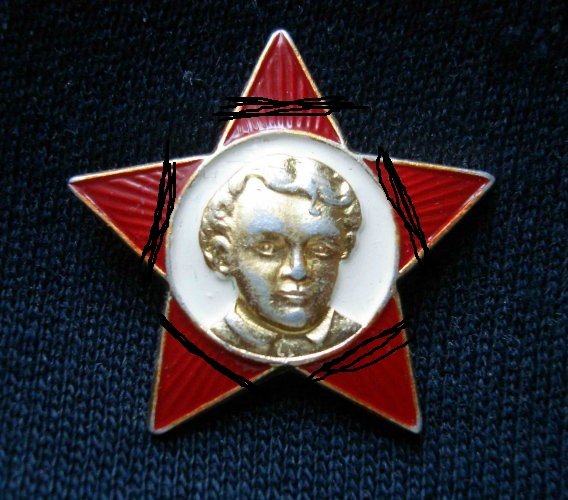 Ленин на значке октябренка