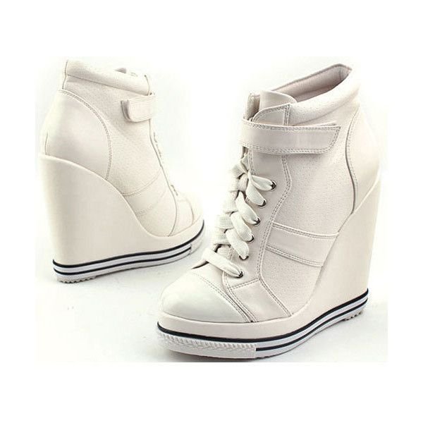 Кроссовки на высокой танкетке женские