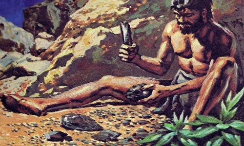 Доисторический человек с камнем