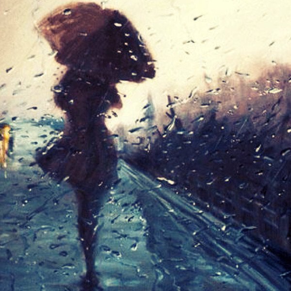 Девушка уходит под дождем