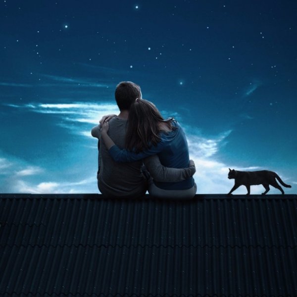 Парень и девушка на крыше