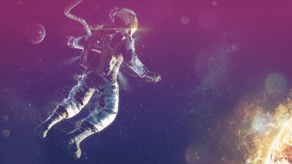 Космонавт летает в космосе