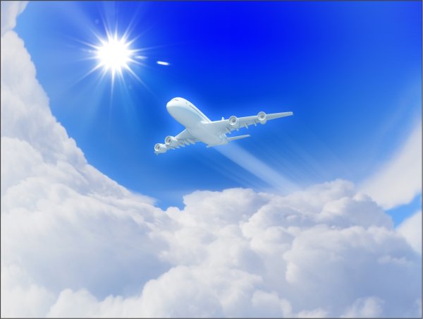 Самолет в голубом небе