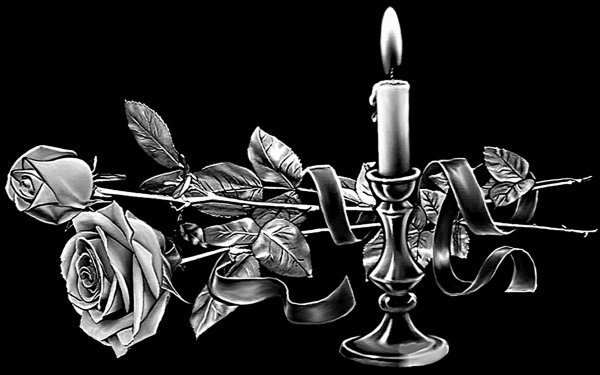 Свеча и цветы на памятник