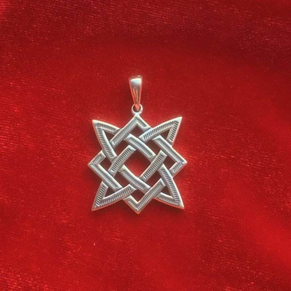 Славянская свастика Сварог