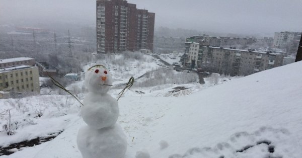 Снег летом в Мурманске