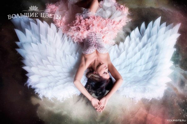 Фотосессия с большими крыльями