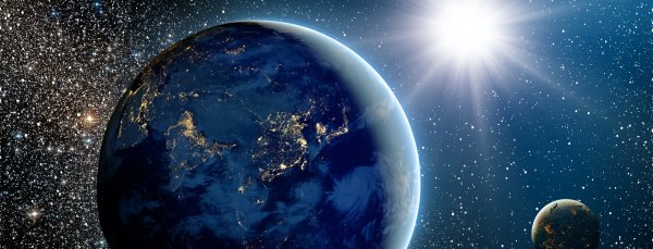 Планета земля освещенная солнцем