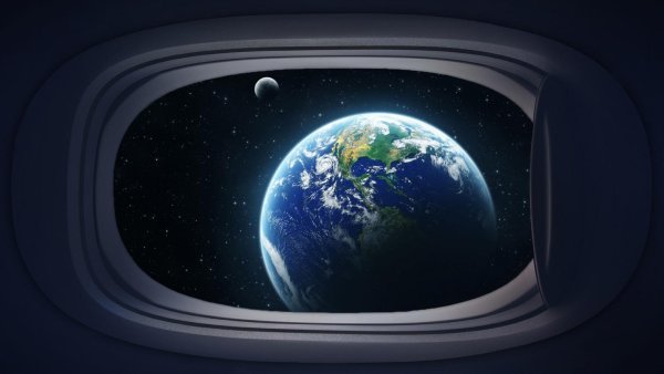 Земля из иллюминатора космического корабля