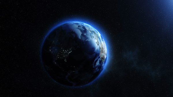Земля из космоса на фоне звезд