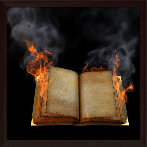 Горящая книга на черном фоне