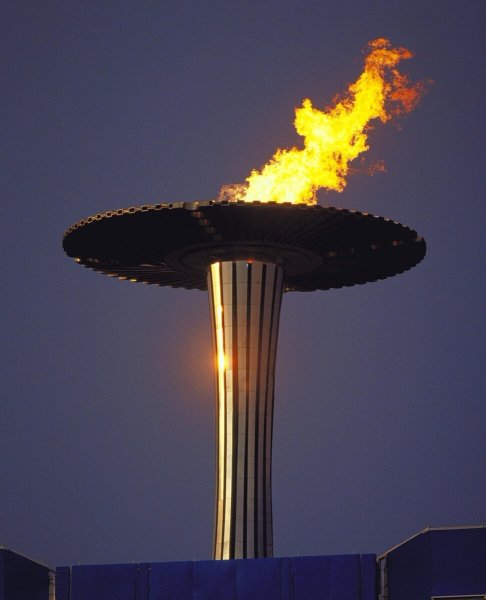 Факел олимпийского огня Олимпийских игр