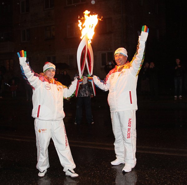 Факелоносец олимпийского огня 2014
