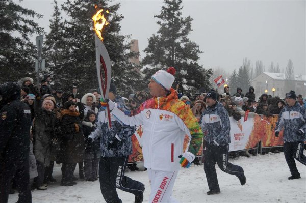 Факелоносец олимпийского огня 2014