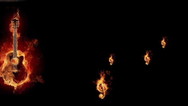 Гитара в огне на черном фоне
